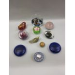 Quantity of glass paperweights including: Perthshire, Costa and Caithness
