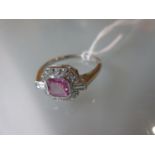 Platinum ring set pink sapphire and brilliant and baguette cut diamonds