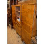 Mid 20th Century Continental figured walnut three section side cabinet, the centre with a door above