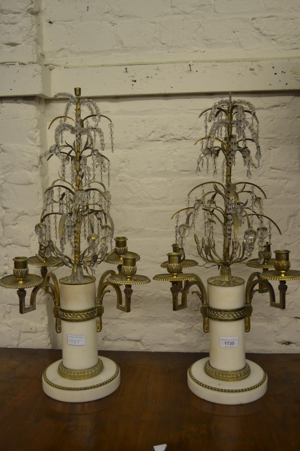 Pair of 19th Century Continental white metal and ormolu four light candelabra with palm tree mounts,