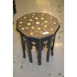 19th Century ebonised octagonal occasional table in Moorish style, the top with ivory inlaid mask