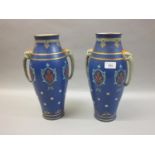 Pair of Villeroy & Boch Mettlach baluster form vases with elephant mask handles, with incised