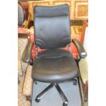 Black leather upholstered adjustable office chair