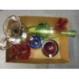 Cranberry Art Glass vase, similar smaller vase, three Art glass trinket dishes, a glass jug and a