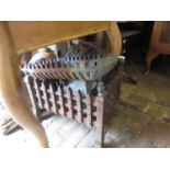 Two iron fire baskets together with a warming pan