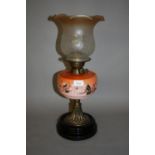 Brass oil lamp with a painted glass well and an etched glass shade