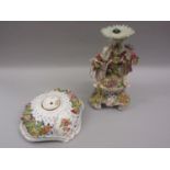 19th Century Continental porcelain centrepiece in the form of figures around a floral encrusted base