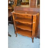 Small French crossbanded fruitwood three shelf open bookcase on cabriole front supports