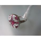 Art Deco style platinum panel ring set rubies and diamonds