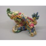 Chinese pottery figure of a dragon, signed with seal marks to base