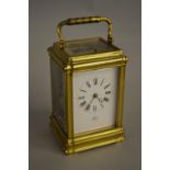 French gilt brass carriage clock examined by Dent, with an hour repeat function