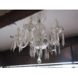 Waterford cut glass five light electrolier together with a set of three twin light wall sconces, all