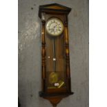 Late 19th or early 20th Century Continental beechwood and ebonised cased Vienna wall clock, the