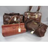 Pink leather Gladstone bag together with three brown leather handbags