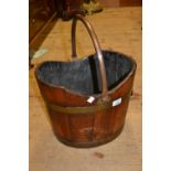 Oval mahogany brass bound bucket with a copper handle, a mahogany stool on four cabriole supports