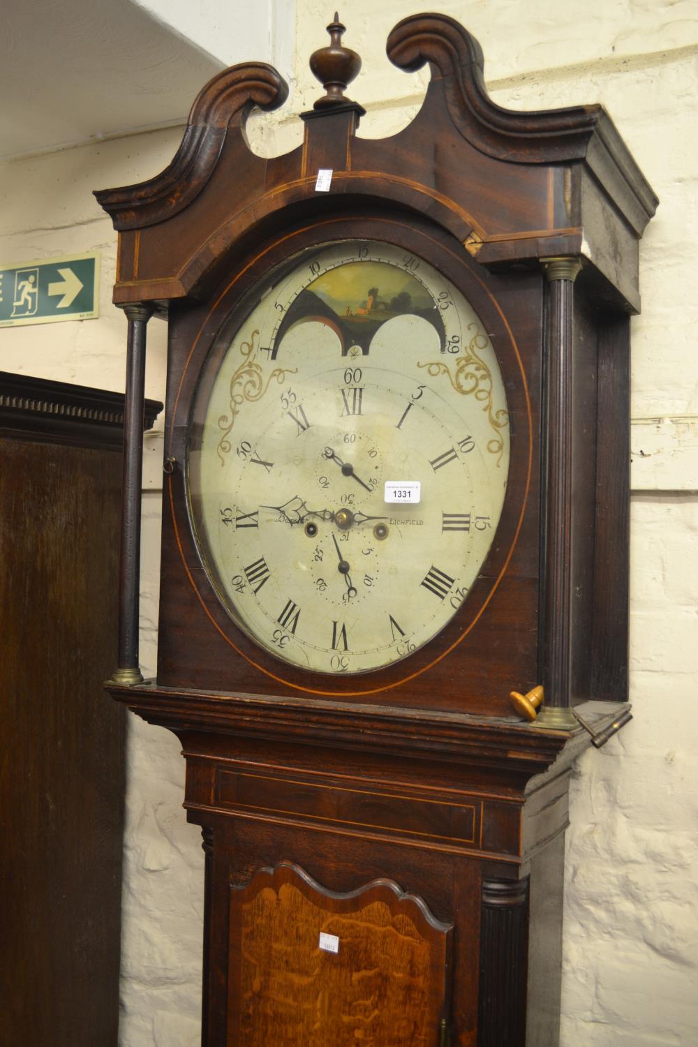 Unusual George III oak and mahogany crossbanded longcase clock, the swan neck pediment above an oval