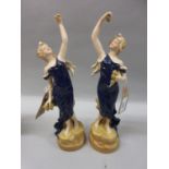 Pair of Royal Dux figures of two classical maidens wearing Royal blue dresses, 10ins high