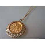 1913 Half sovereign in a 9ct gold mount with chain