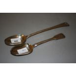 George III silver basting spoon with bright cut decoration together with a George III Newcastle