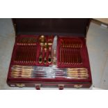 German twelve place setting canteen of gold plated cutlery with original carry case