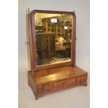 Early 19th Century mahogany swing frame rectangular dressing table mirror having three jewel drawers
