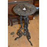 Black painted cast iron plant stand