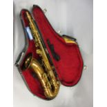 Conn 10M tenor saxophone, serial No. 284608 in a fitted case with tuner, mouthpiece and strap