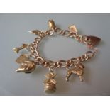 9ct Gold alternating curb link charm bracelet with padlock clasp