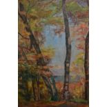 M.T. Turgis, signed oil on canvas, figure in a wooded coastal landscape, inscribed on artists