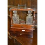 Three bottle tantalus (at fault), a mahogany writing box (at fault) and a gilt wall bracket)