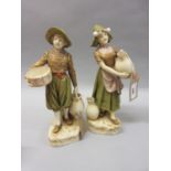 Pair of Royal Dux figures of a Dutch boy and girl in traditional costume, 10ins high