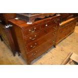 19th Century mahogany straight front chest of three short and three long drawers with brass swan