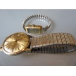 9ct Gold cased Accurist wristwatch with automatic movement on a metal expanding bracelet together