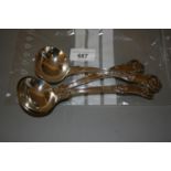 Set of three William IV silver Honeysuckle pattern sauce ladles