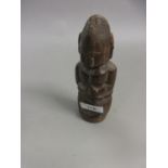 Small native carved wood fertility figure