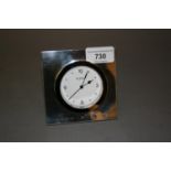 Silver cased digital clock