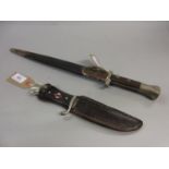 German Hitler Youth knife in leather sheath, with a chrome wooden and steel grip with enamel badge