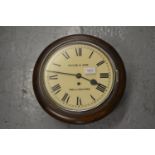 Beech circular wall clock signed Payne & Son