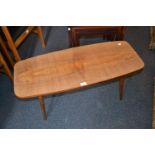 Mid 20th Century mahogany coffee table on turned tapering supports