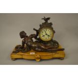 French brown patinated spelter figural two train mantel clock on a marble base