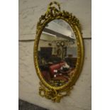 19th Century oval gilt moulded plaster girandole three branch wall mirror