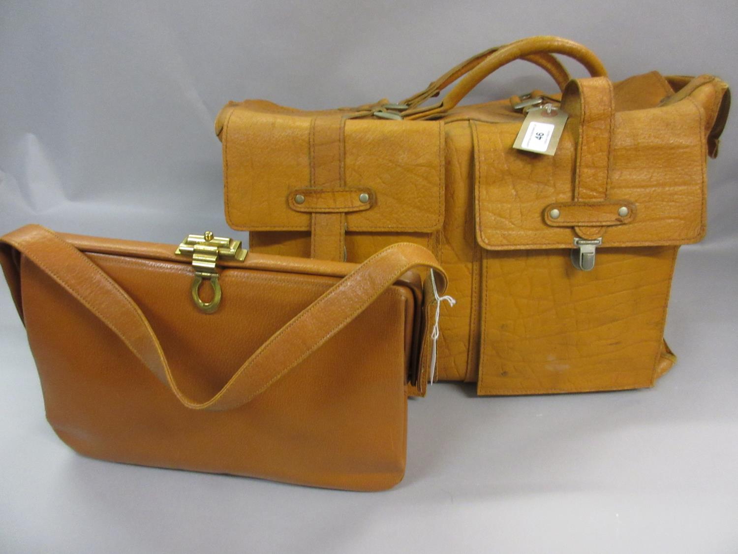 Tan leather holdall together with a tan 1950 / 60's handbag, The Voyager