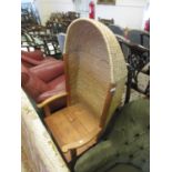 20th Century pine Orkney chair, the woven sea grass back above a panel seat, shaped arms and