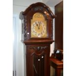 Early 20th Century mahogany longcase clock, the shaped broken arch hood above a bevelled glass