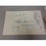 Parlophone Records hand bill, bearing Beatles signatures to the verso