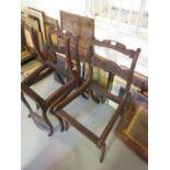 Set of four Regency rosewood dining chairs with carved rail backs (for restoration)