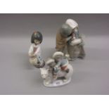 Lladro group of two children together with two similar Royal Copenhagen groups