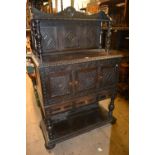 Late 19th Century Continental dark oak dresser / side cabinet, the carved canopy back above three