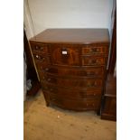 Good quality reproduction mahogany and line inlaid bow front chest of five short and four long