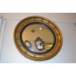 Pair of gilt framed convex mirrors